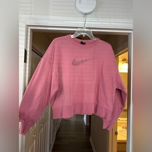 Pink slightly cropped Nike sweatshirt